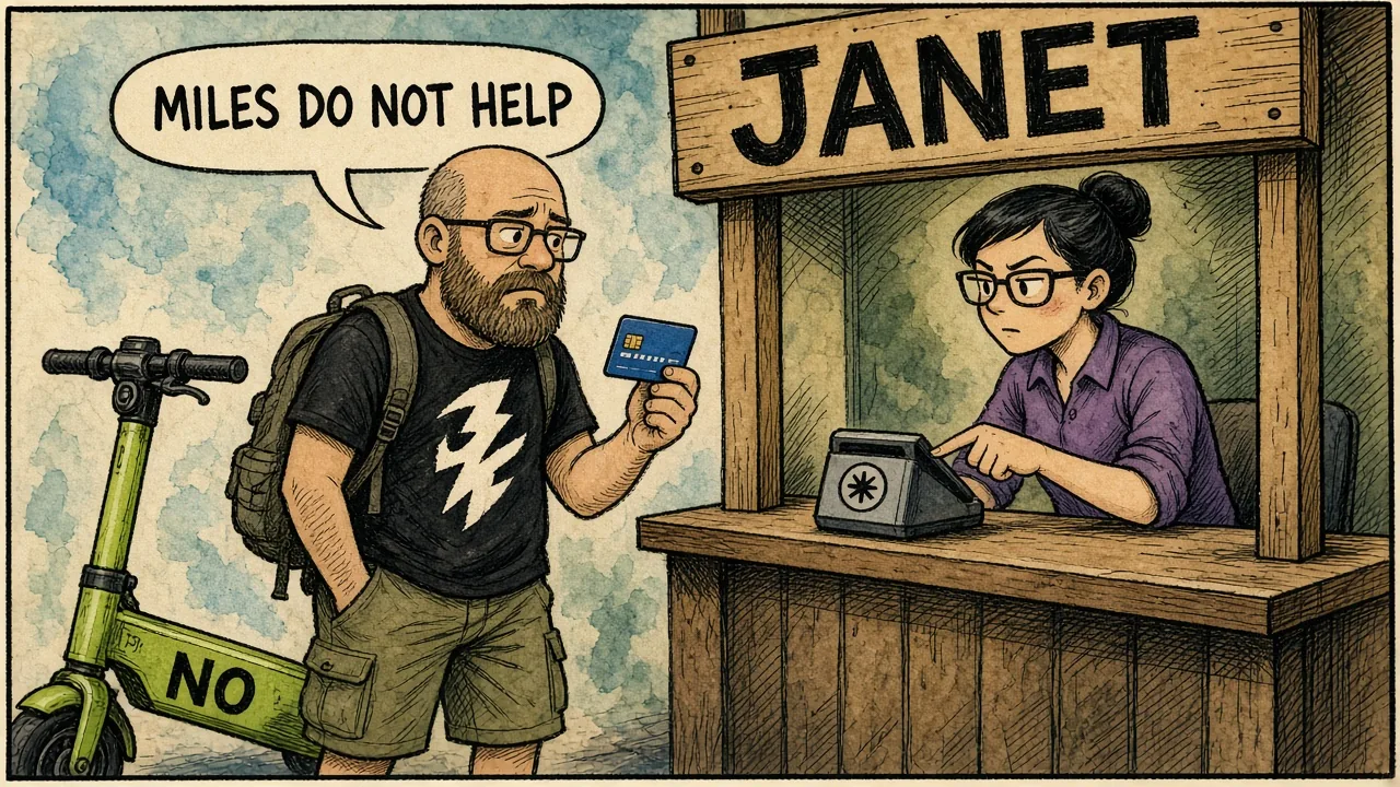Host at a fake ticket counter labeled JANET while the agent points to a badge reader