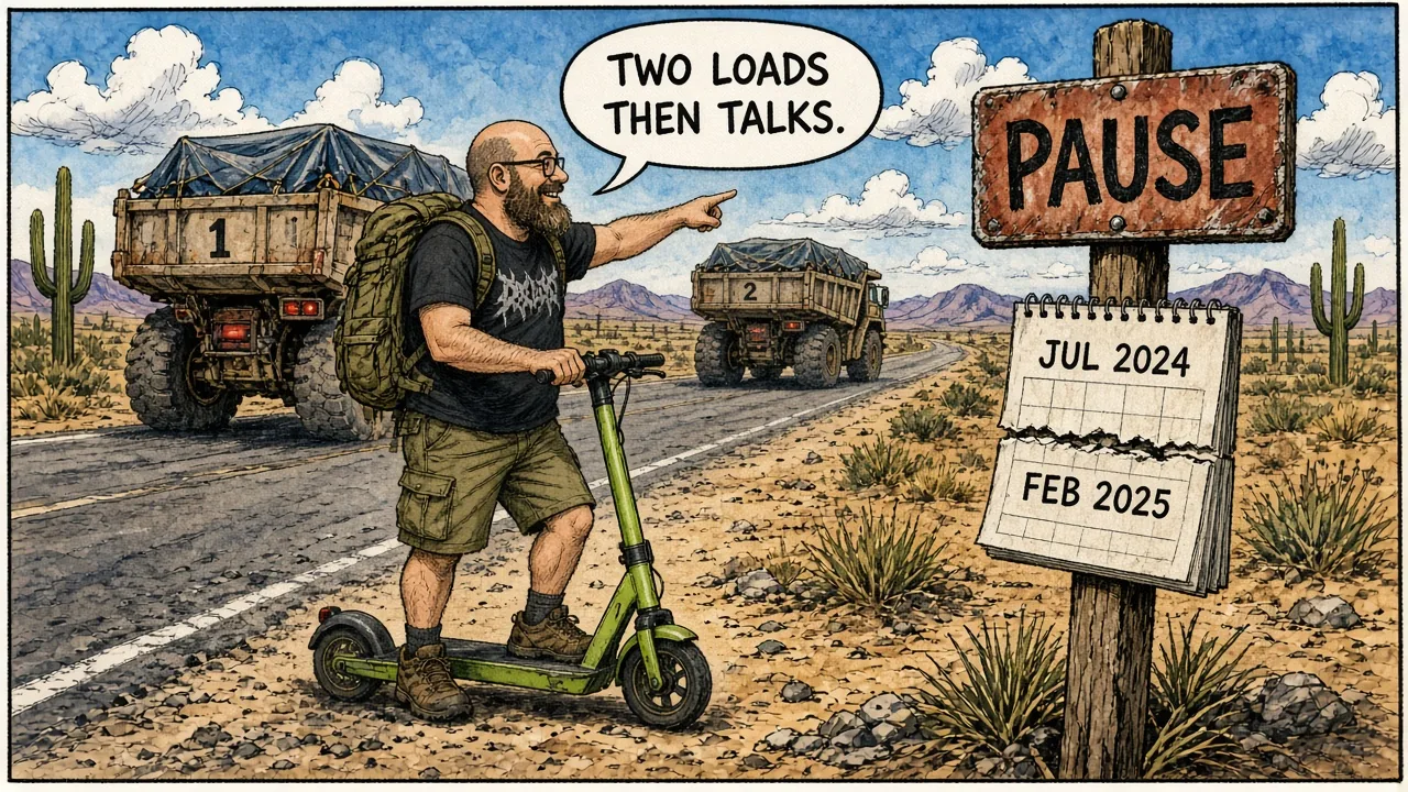 HOST counting two trucks then hanging a PAUSE sign during tribal talks