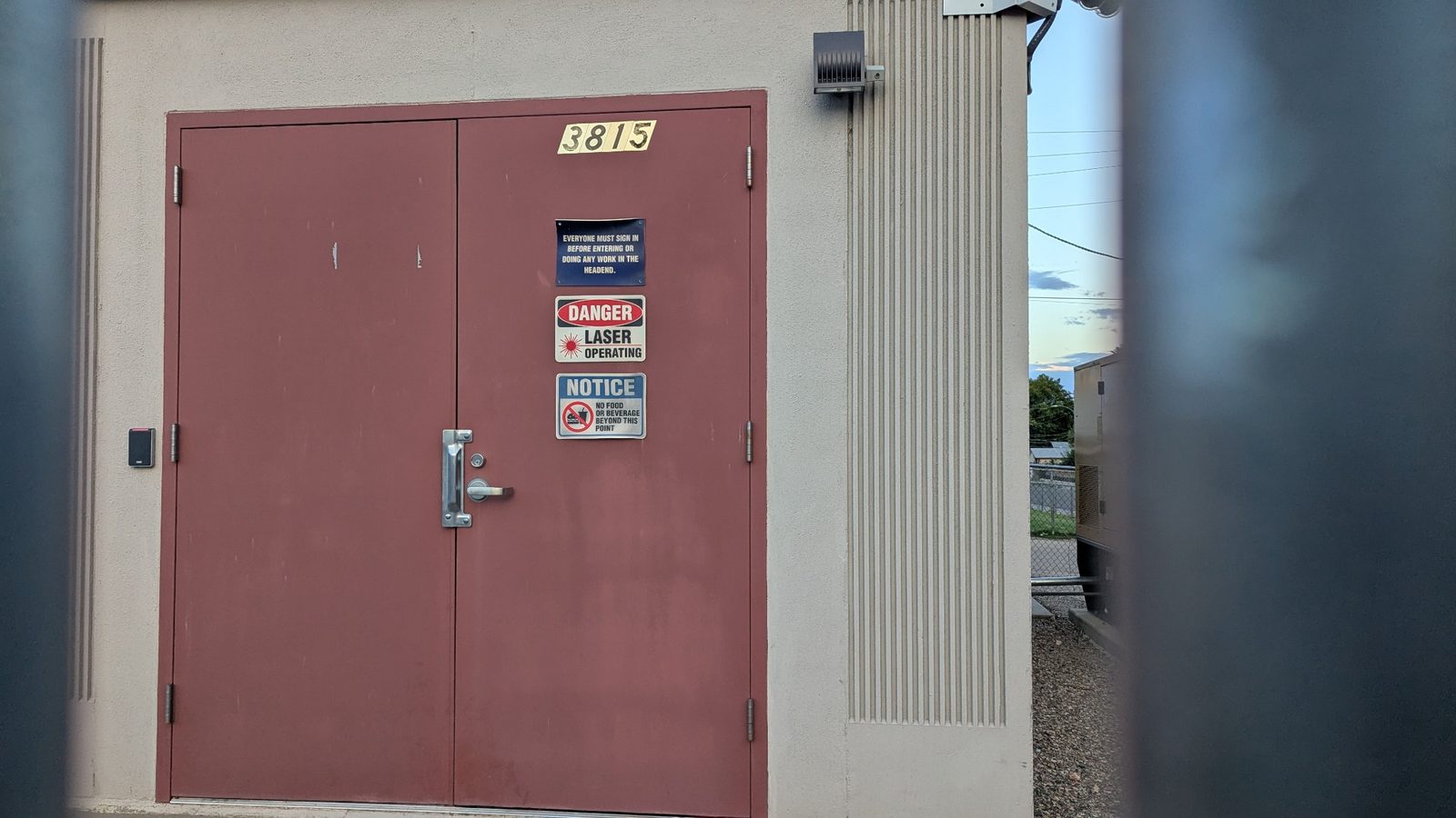 A locked utility building makes “what’s in there?” feel like a formal invitation.