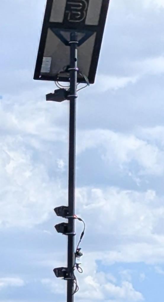 Solar panel with B logo above camera heads