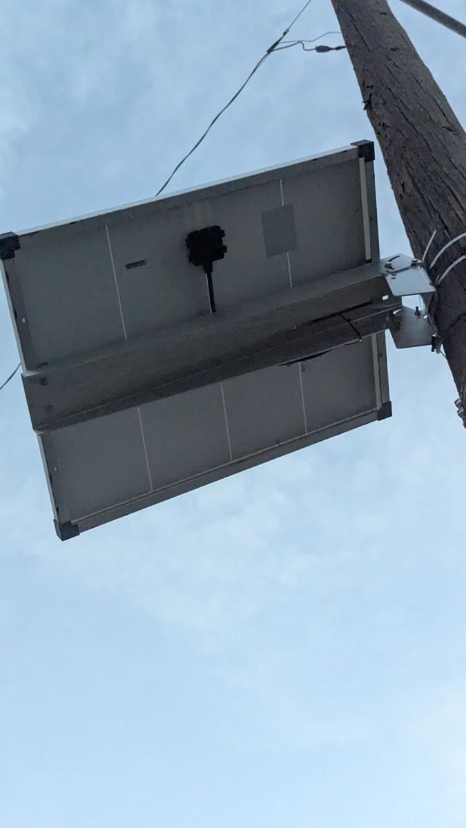 Underside of a pole-mounted solar panel